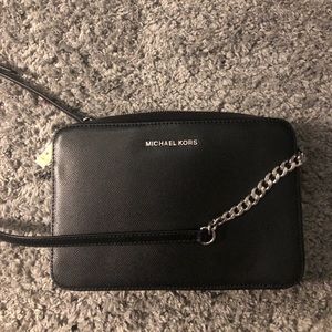 michael kors black crossbody with silver hardware
